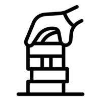 Hand placing wooden block on top of tower, building stability concept vector