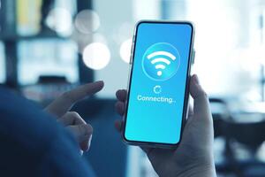 Man using smartphone connects to wireless fidelity Wi-Fi internet on smartphone. Concepts of technological, wireless network connections, security cyber, and WiFi encryption. photo