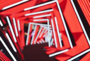 Abstract blur tunnel with red and white neon lights background photo