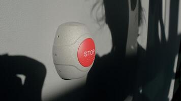 Stop Button and the Hand of Worker About to Press it. emergency stop button. Big Red emergency button or stop button for manual pressing. photo