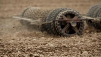 Track shoe of the excavator with soil in the background. photo