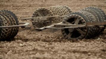 Track shoe of the excavator with soil in the background. photo