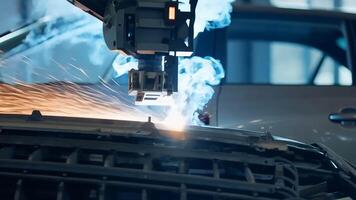 Car manufacturing production line modern assembly welding chassis automotive industry workshop line factory automobile technology research robot arm automation progress precision quality video