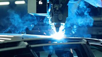 Car manufacturing production line modern assembly welding chassis automotive industry workshop line factory automobile technology research robot arm automation progress precision quality video