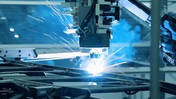 Car manufacturing production line modern assembly welding chassis automotive industry workshop line factory automobile technology research robot arm automation progress precision quality video