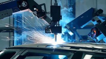 Car manufacturing production line modern assembly welding chassis automotive industry workshop line factory automobile technology research robot arm automation progress precision quality video