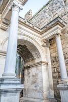 Arch and comlum at Hadrian's gate photo