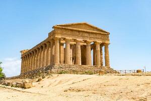 Agrigento, Italy-May 10, 2022-The Temple of Concordia inside the valley of the temples, an archaeological park near Agrigento during a sunny day photo