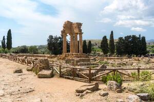 Agrigento, Italy-May 10, 2022-view of the Sanctuary of the Chthonic Divinities inside the valley of the temples, an archaeological park near Agrigento during a sunny day photo