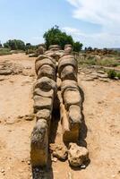 Agrigento, Italy-May 10, 2022-view of the Telamon inside the valley of the temples, an archaeological park near Agrigento during a sunny day photo