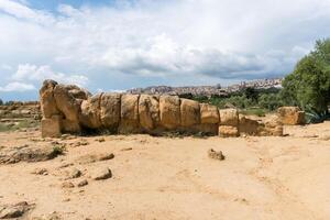 Agrigento, Italy-May 10, 2022-view of the Telamon inside the valley of the temples, an archaeological park near Agrigento during a sunny day photo