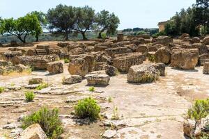 Agrigento, Italy-May 10, 2022-view of the Sanctuary of the Chthonic Divinities inside the valley of the temples, an archaeological park near Agrigento during a sunny day photo
