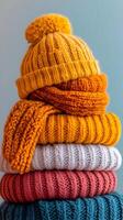 Cozy Stack of Warm Knitted Winter Accessories in Vibrant Colors photo