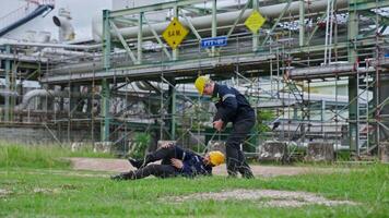 An engineer was injured in an accident while working at an oil refinery. video