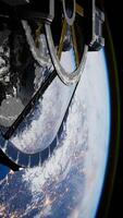 Cargo spaceship on orbit of planet Earth, vertical video
