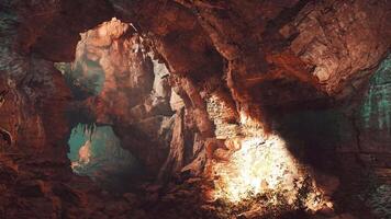 A cave filled with lots of rocks and water video