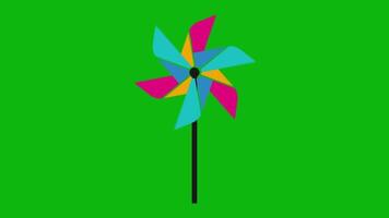 Spinning Paper Pinwheel Colorful Rotation Animation Illustration on Green Background video