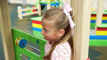 Interactive playtime at colorful playground with kids engaging in fun activities video