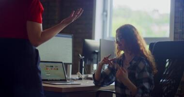 Team of modern businesswomen engage in a dynamic discussion, collaborating on projects and working together to find innovative solutions to their business challenges video