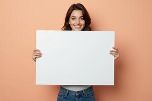 Woman Holding a Blank White Sign with a Smile photo