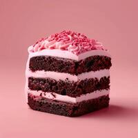 A Slice of Chocolate Cake with Pink Frosting and Sprinkles photo