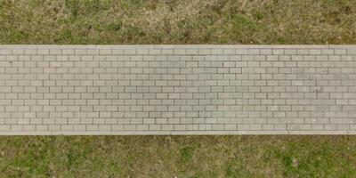 top view of surface of paving slabs and pedestrian footpath photo