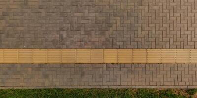 top view of surface of paving slabs and pedestrian footpath photo