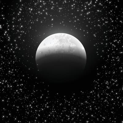 A full moon in the night sky with stars