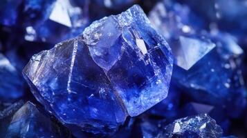 Vivid tanzanite close-up with bright blue and purple facets, smooth textures photo