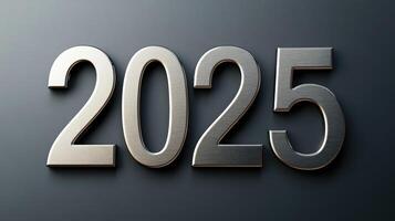 Elegant 2025 in silver serif font on a smooth gray background. photo