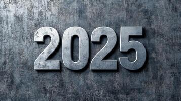 Elegant 2025 in silver serif font on a smooth gray background. photo