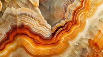 Polished agate with vibrant orange and blue layered patterns. photo