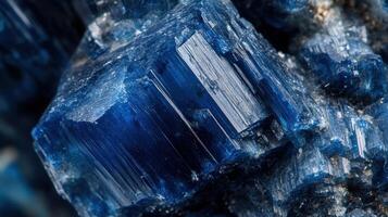 Deep blue kyanite crystal with unique formations and clear facets. photo