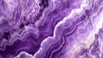 Close-up of charoite crystal highlighting its rich purple hues and intricate patterns. photo