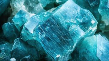 Polished apatite with vivid blue tones and sharp crystal formations. photo