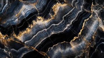 Detailed view of onyx stone, emphasizing its deep black hues intertwined with shimmering gold veins. photo