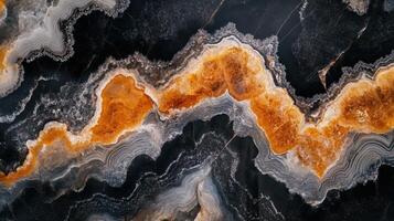 Detailed view of onyx stone, emphasizing its deep black hues intertwined with shimmering gold veins. photo