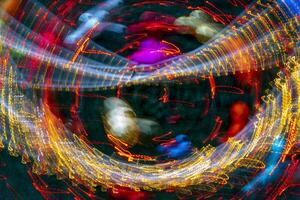 A pattern of glowing lines of light. Abstract design background. photo