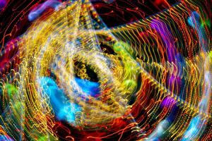 A pattern of glowing lines of light. Abstract design background. photo
