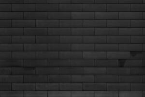 Brick wall of the building. Designer building background. photo