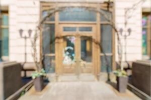 Blurred background of a city street. Blurred photo of a modern city.