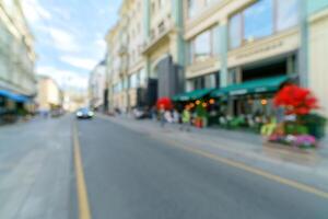 Blurred background of a city street. Blurred photo of a modern city.