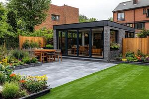 Beautiful modern garden office building featuring a stone stepping path and artificial turf lawn photo