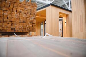 Newly built single storey prefabricated modular building. Prefabricated mobile wooden house at construction site photo