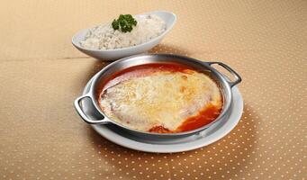Chicken Parmigiana Fillet with white rice photo