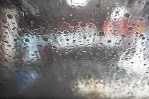 View from the inside of a car in an automated car wash. photo