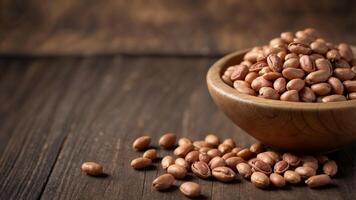 Pinto Beans on Wood Background with Ample Copy Space. photo