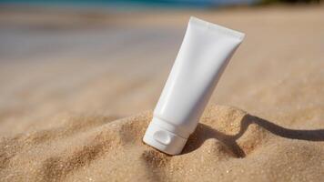 blank white tube for sunblock on sand beach background. photo