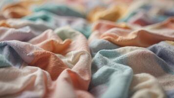 patchwork blanket background in pastel colors. photo
