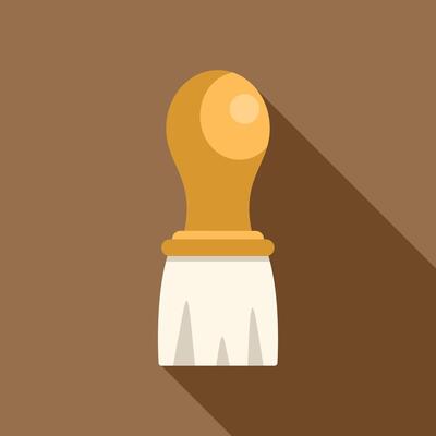 Shaving brush casting long shadow on brown background